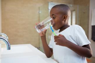 Boy drinking water
