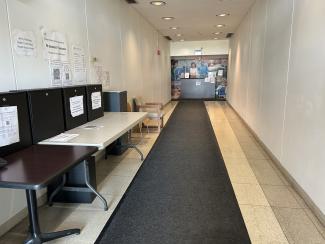 There are secure dropboxes inside the north entrance (near the security desk) that you may use during regular business hours. 