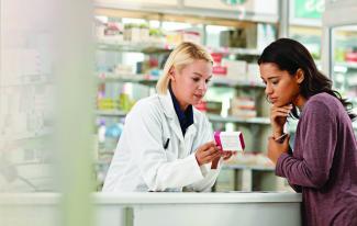 Person talking with pharmacist